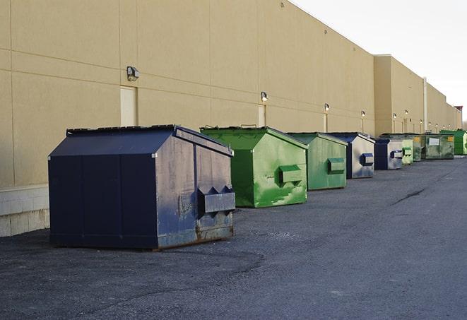 metal waste containers sit at a busy construction site in Valier, IL